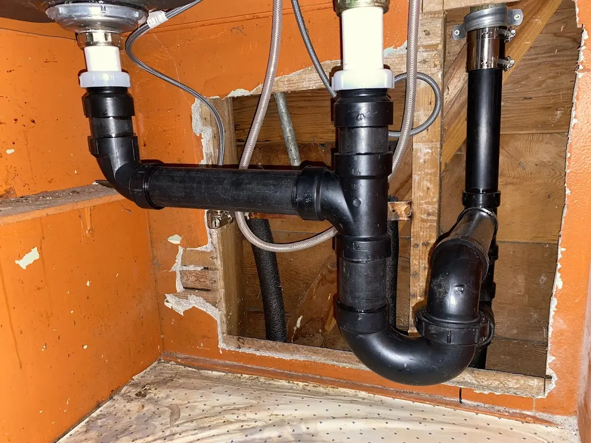 Professional Garbage Disposal Repair equipment and tools on the job in The Colony